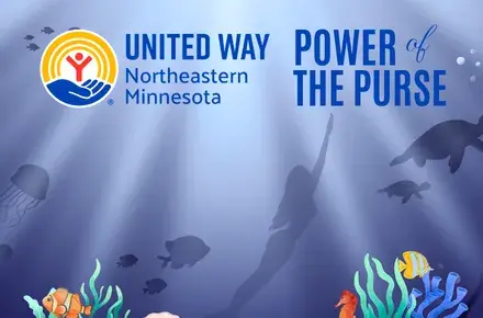 Under the sea imagery (fish, mermaid, sand) filter through watery light. In foreground, UWNEMN logo and the words Power of the Purse.