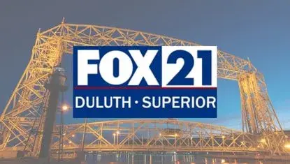 FOX 21 Duluth Superior logo in front of Duluth Lift Bridge
